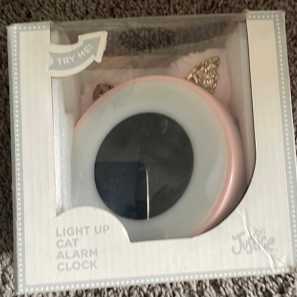A light up  clock with cat ears